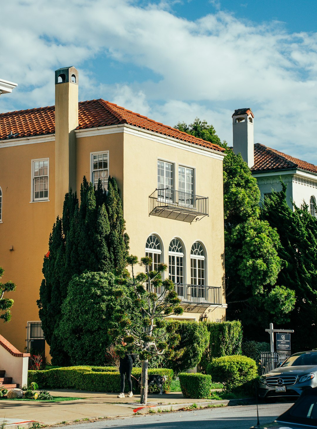 Elegant boutique storefront facade in an upscale residential neighborhood