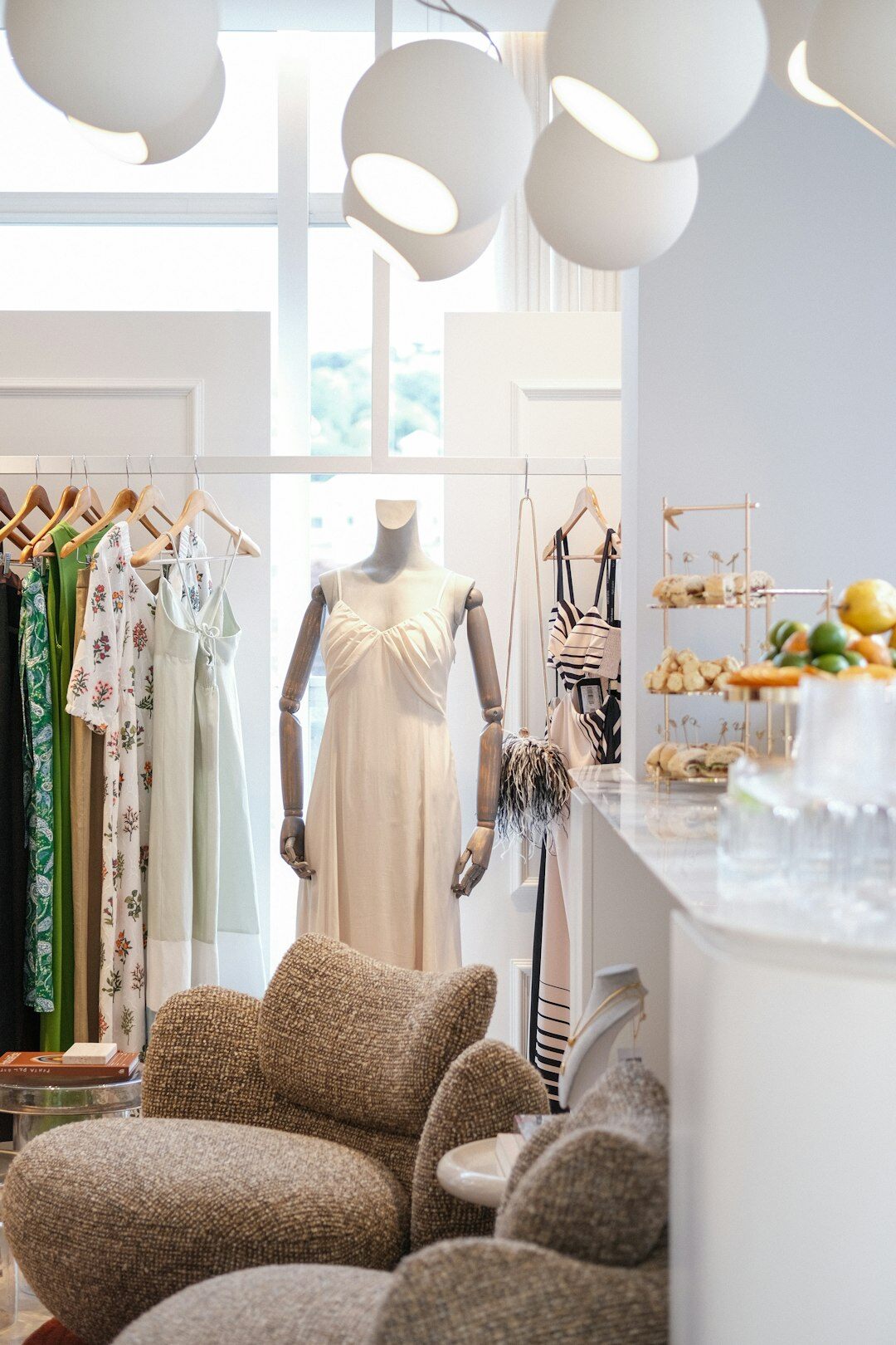 Bright modern boutique interior with glass display cases