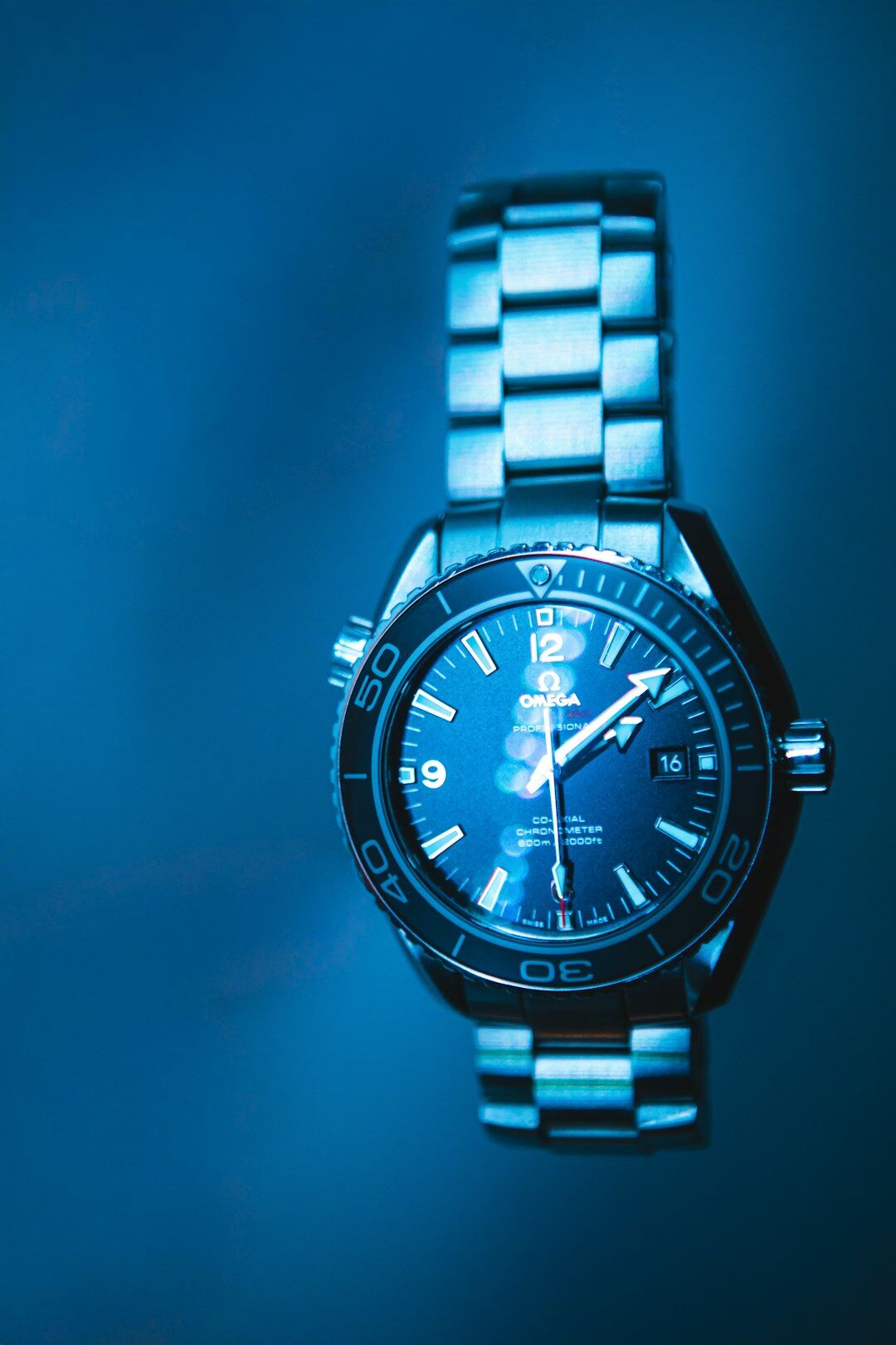 Steel diving chronograph watch with blue dial