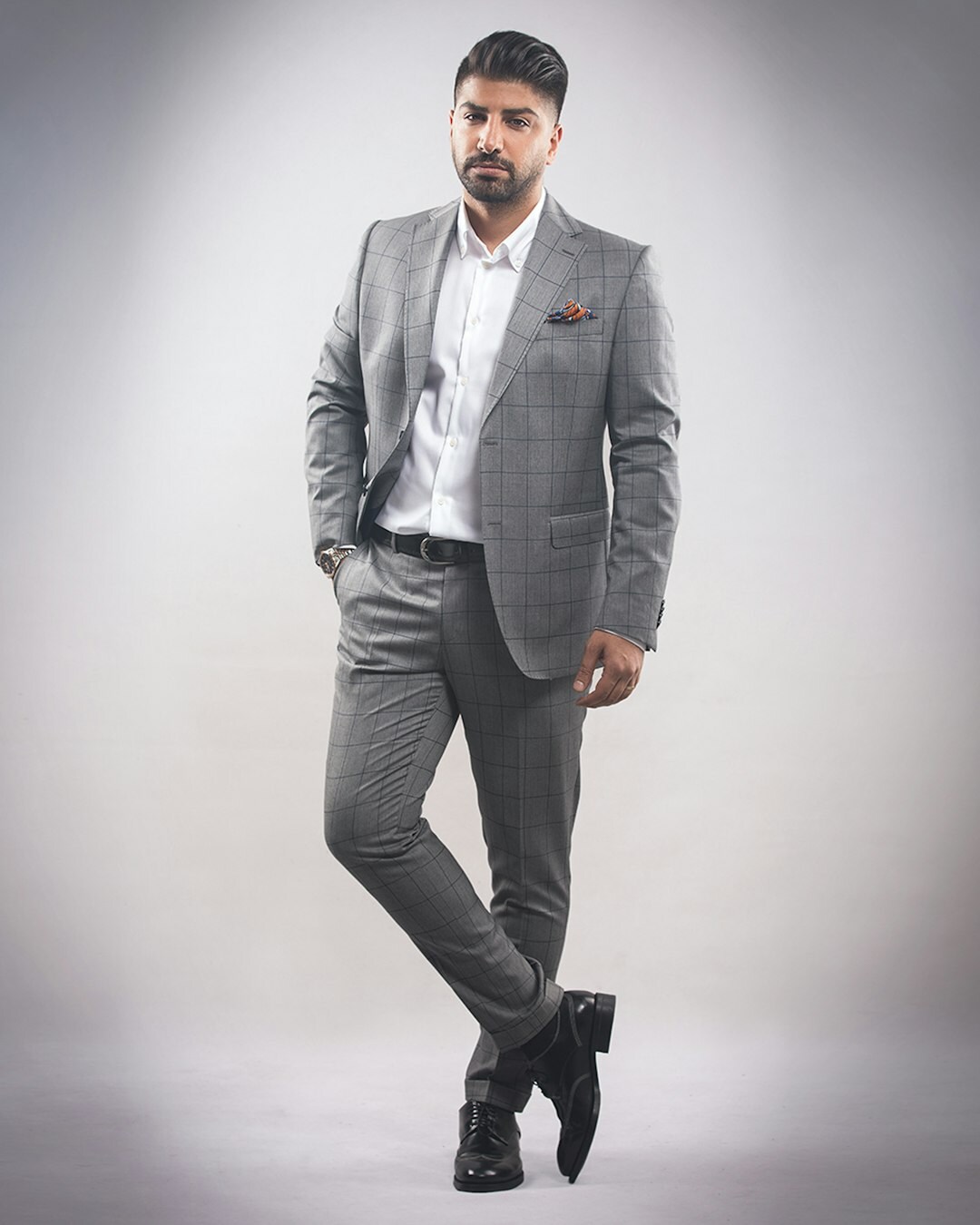 man wearing tailored suit